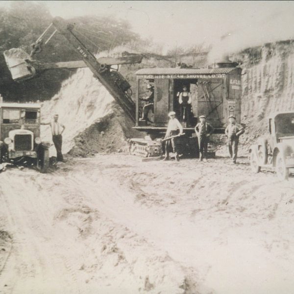 An erie steam shovel loads trucks in an E&E Seegmiller pit (1929