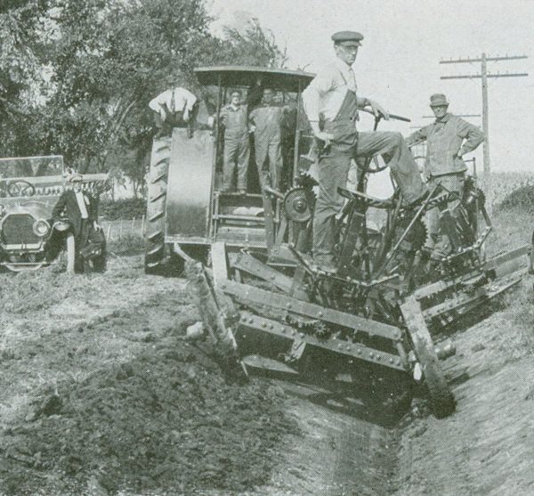 Two Adams 12-foot leaning wheel graders forming a ditch (1920s)